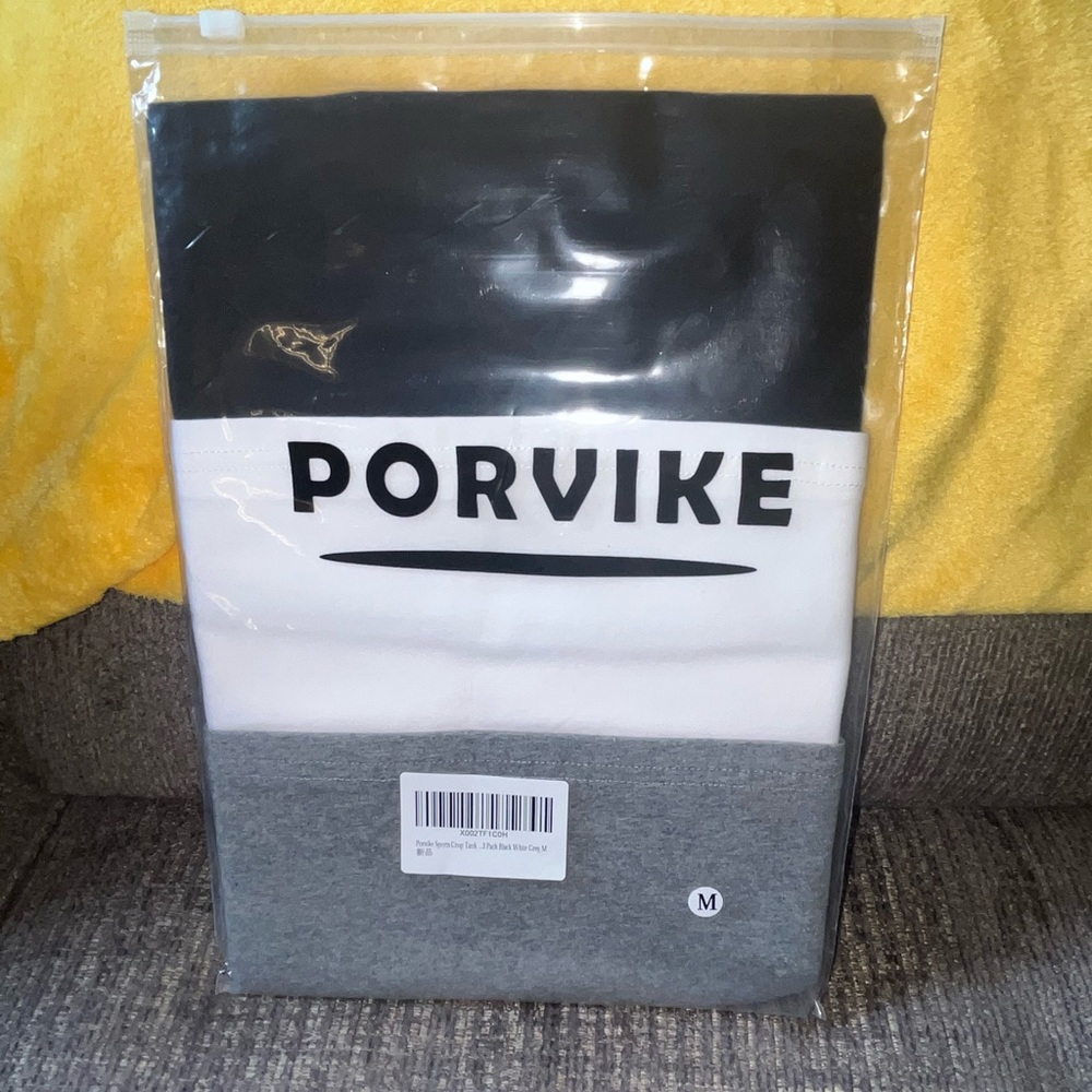 3 pack tank top crop tops . Black, white and grey. Size medium.NEW Never opened
